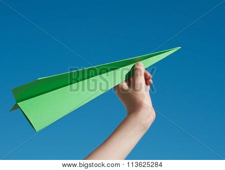 Green paper aeroplane