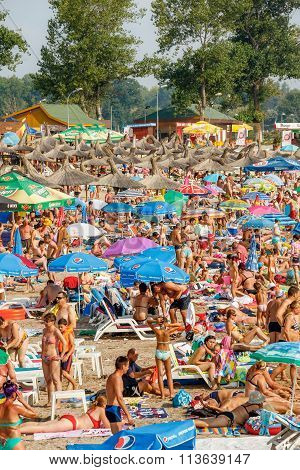 Neptun Jupiter, Romania - Jully 31, 2015 Unidentified People Enjoying The Sun On A Crowded Beach At