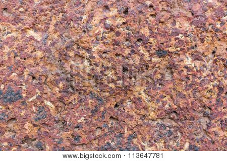 background of red stone pattern old.
