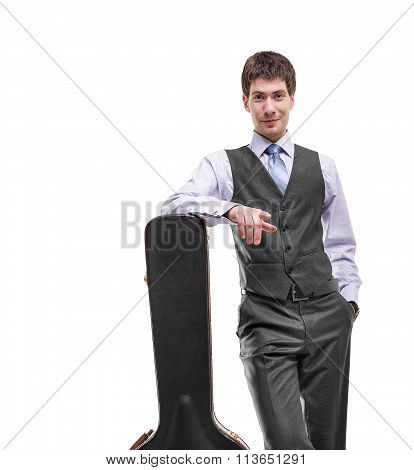 Musican with acoustic guitar in case.