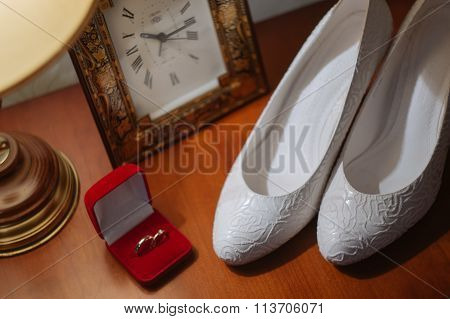 Wedding shoes and rings