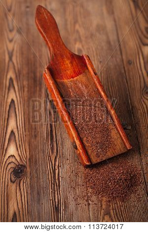 grated chocolate flakes on vintage  wooden grate  shallow DOF