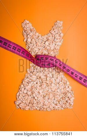 Dress Shape Made From Oatmeal With Measuring Tape