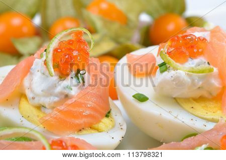 Eggs with salmon and caviar