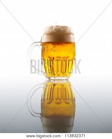 Full Glass Of Beer With Foam