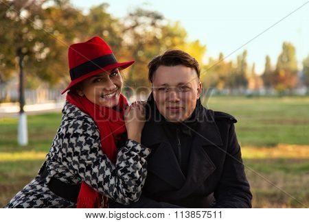 Young and beautiful ukrainian couple is smiling