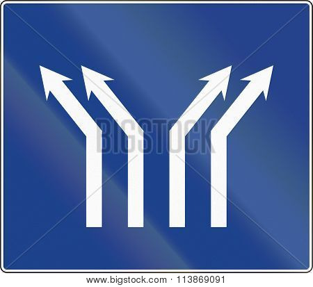 Road Sign Used In Spain - Fork In Four-lane Road