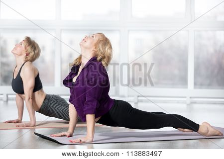 Senior Women Doing Upward-facing Dog Pose