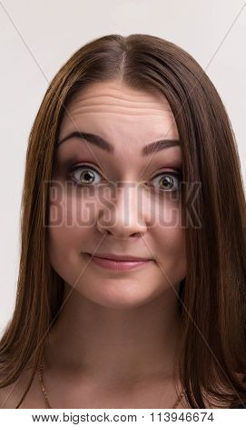 Emotion series of young and beautiful ukrainian girl - wondering and smiling