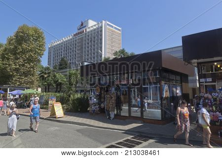 Adler, Sochi, Krasnodar region, Russia - July 17, 2016: View of the little shops in the resort town of Adler and the building hotel 