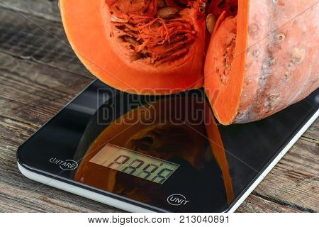 Cut Pumpkin On The Scales