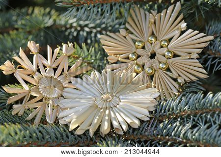 Straw star on a Christmas tree, decorati