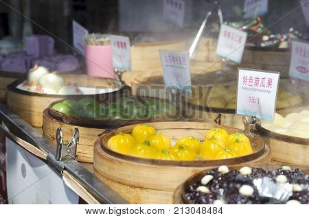 SUZHOU, CHINA - MARCH 31, 2013 - Sweet snack stall on Pingjiang ancient street, Suzhou, China