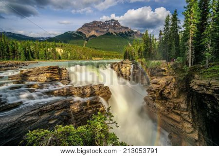 Upper Sunwapta Falls in Jasper National Park, Canada. The water originates from the Athabasca Glacier. Long exposure.