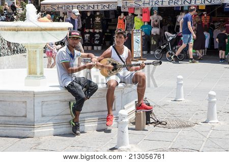 Chania Crete Greece - June 27 2017: Street musicians perform in the streets of Chania Crete