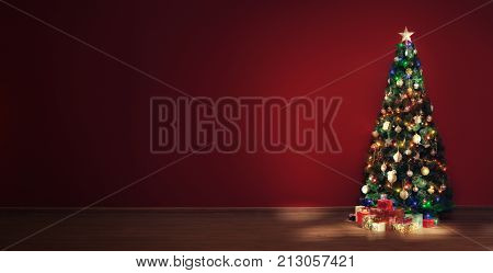 view of nice decorated christmas tree and some gift boxes indoor