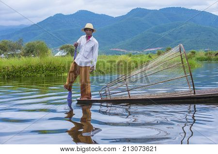 INLE LAKE MYANMAR - SEP 07 : Burmese fisherman at Inle lake Myanmar on September 07 2017 inle Lake is a freshwater lake located in Shan state