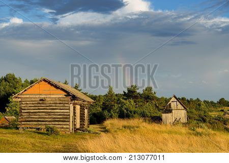 Abandoned houses in the Baltic Sea. Shore nature and ruins facilities architecture concept. Mohni small island in Estonia Europe.