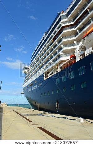 FALMOUTH, JAMAICA - DEC 29, 2014: Holland American Line Cruise ship Zuiderdam anchore offshore in Falmouth, Jamaica. Falmouth port is built by Royal Caribbean Cruise company in 2012.