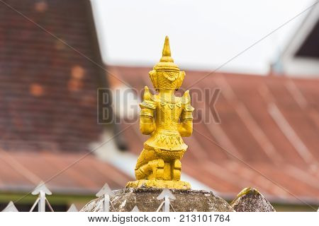 Statue Of A Buddhist Godt, Louangphabang, Laos. Close-up. Copy Space For Text. Back View.