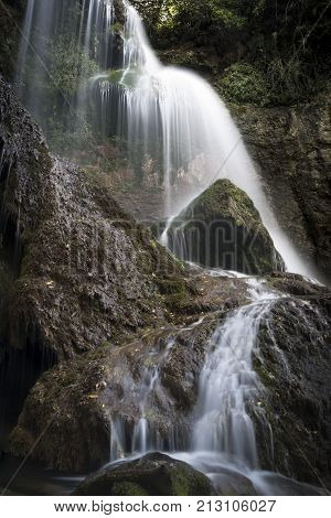 Waterfall. Beautiful view of a waterfall among cliffs in spring time, Krushuna waterfalls in Bulgaria