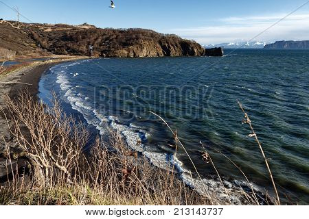 Beautiful seascape of Kamchatka Peninsula: spring view of Avachinskaya Bay or Avacha Bay (Pacific Ocean). Eurasia Russian Far East Kamchatka Region.