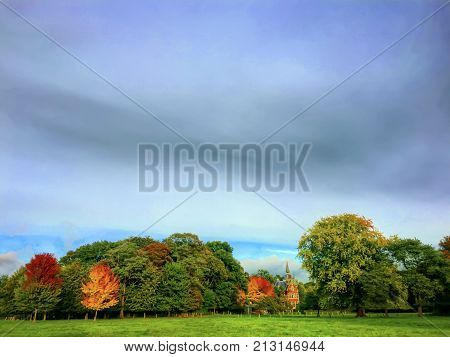 Beautiful green flat landscape with deep blue sky and clouds in the Belgian Kempen, province Antwerpen, Turnhout