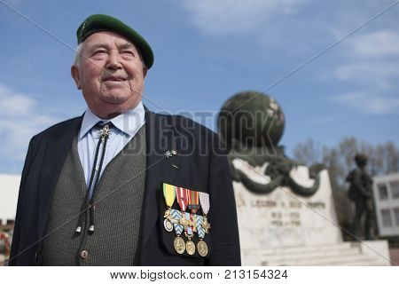 Aubagne, France. May 11, 2012. Portrait of a veteran of the French Foreign Legion in a green beret at the monument in memory of the dead legionaries.