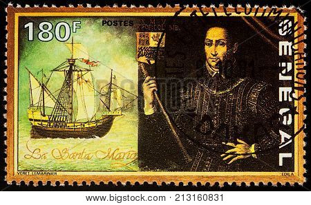 Moscow Russia - November 09 2017: A stamp printed in Senegal shows Christopher Columbus and his ship Santa Maria series 