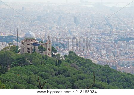 Tibidabo. Beautiful view of Barcelona from the mountain of Tibidabo. The city is surrounded by forest and nature.