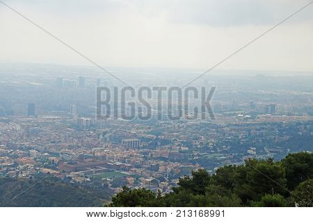 Tibidabo. Beautiful view of Barcelona from the mountain of Tibidabo. The city is surrounded by forest and nature.