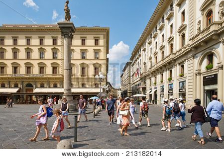 FLORENCE,ITALY - JULY 22,2017 : Tourists and locals at  Piazza della Repubblica in Florence