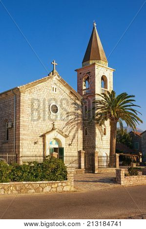 Catholic Church of Saint Roch in Donja Lastva village near Tivat city on a sunny winter day. Montenegro