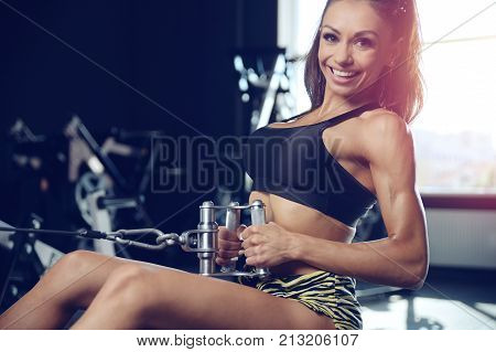 Sexy Athletic Young Girl Training Back In Gym