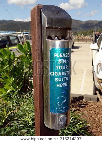 A close up view of a receptacle for placing your cigarette butts