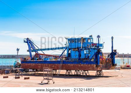 Ship Loader On The Shore. Ship Repair In Sete, France. Copy Space For Text