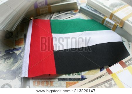 United Arab Emirates Flag ( Dubai Flag ) Surrounded With American Money ( Foreign Investments )