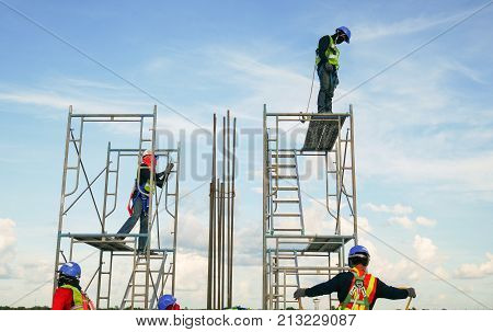 construction worker on scaffolding in industrial construction