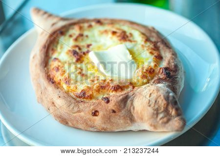 Adjarian Khachapuri With Eggs On The Table