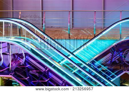 Colorful Escalators Lit By Neons In A Mall Of Moscow, Russia