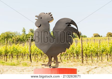 The symbol of the Chianti Classico wine along a road in Tuscany