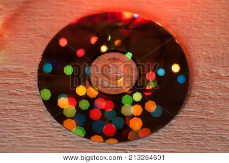 CD-ROM. DVD. Disk. Boken background. The reflection on the disk