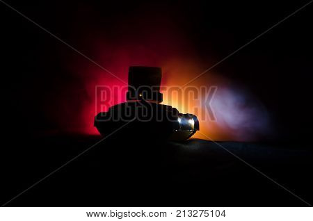 Mobile Rocket Launch With Fire Clouds On A Dark Background. Gloomy Sky At Night. Balistic Rockets