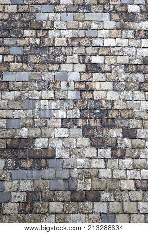 Slate tiles as a natural background texture in a vertical format