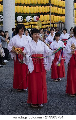 Hiroshima, Japan -  May 27, 2017: Manto Mitama Matsuri festival at the Hiroshima Gokoku-jinja Shrine, the spectacle of 100 shrine maidens dancing by lantern light 