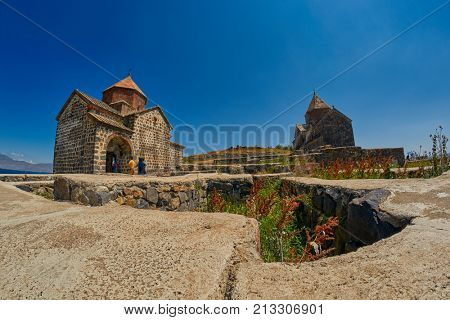 SEVANAVANK MONASTERY, ARMENIA - 02 AUGUST 2017: Famous Sevanavank Monastery Landmark on Scenic Lake Sevan in Armenia