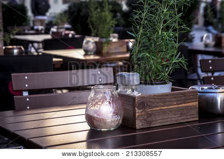 Table and items in a cozy European cafe close-up.