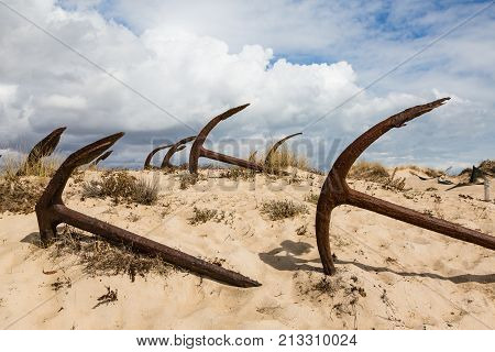 Natural Cemetery Of Marine Anchors At Barril Beach, Portugal