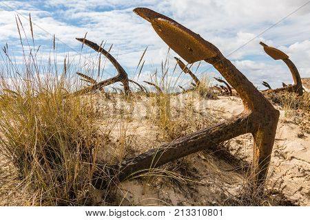 Natural Cemetery Of Marine Anchors At Barril Beach, Portugal
