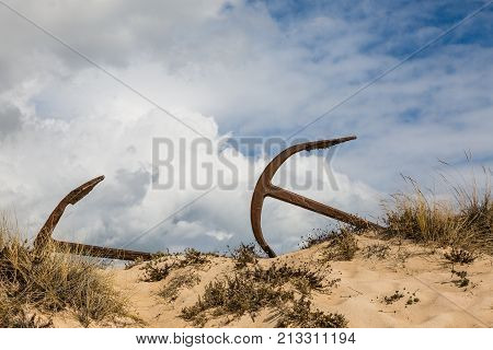 Natural Cemetery Of Marine Anchors At Barril Beach, Portugal
